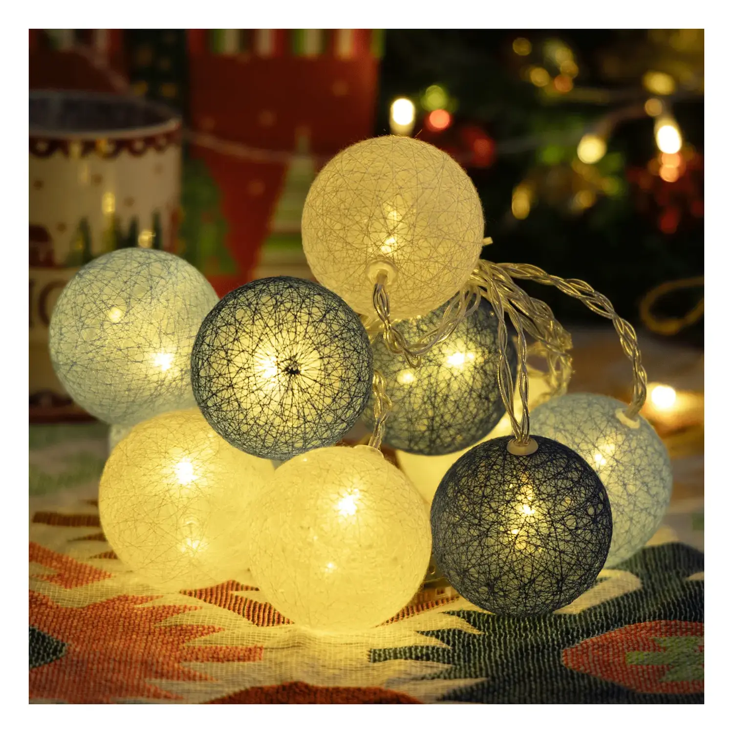 immagine Catena luminosa a batteria 3AA, luci a batuffoli colori misti gradazioni di blu, bianco caldo 2m