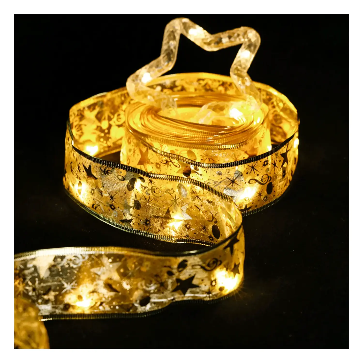 immagine del prodotto Catena luminosa a batteria 3AA per albero di Natale, nastro dorato con puntale a stella, bianco caldo 5m IP44, Interno&Esterno